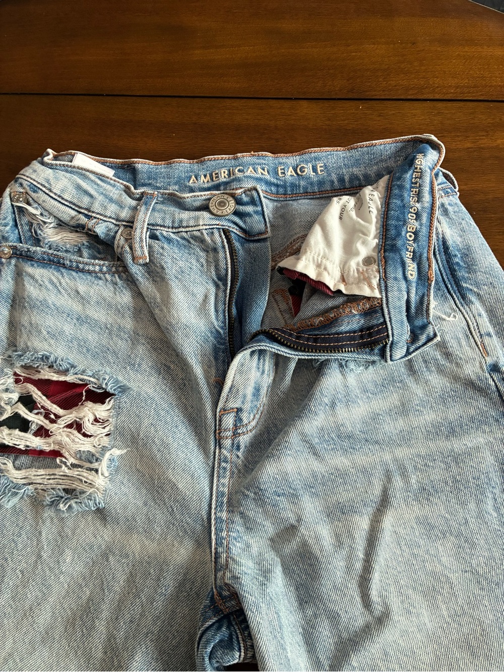 American Eagle Outfitters Light Blue Ripped Boyfriend Jeans with Red Underlay